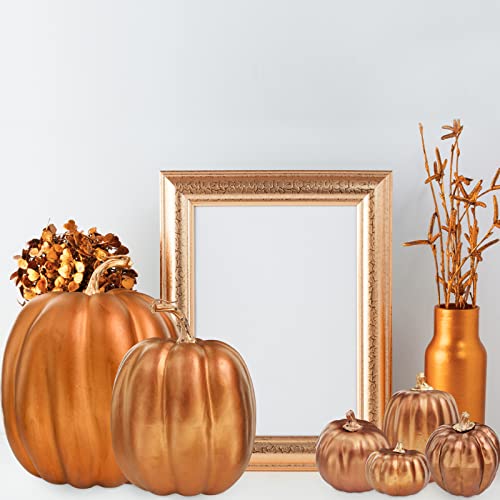 Image of Winlyn 7 Pcs Assorted Sizes Artificial Metallic Bronze Pumpkins Rustic Decorative Fall Foam Pumpkins for Gifts Thanksgiving Halloween Harvest Fall Wedding Table Centerpiece Mantel Shelf Decor