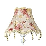 Ses pompons et franges délicats ajoutent du charme aux intérieurs vintage, rustiques ou traditionnels