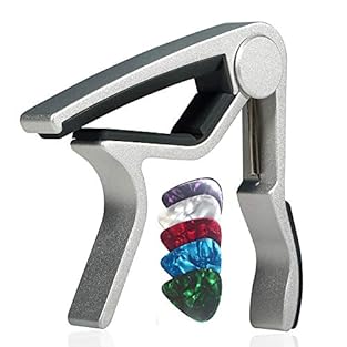 ✔︎Quick Release : super easy to clip on guitar and quick to change. It can even change keys during a song,just clamp it and let your song fly. ✔︎Versatile: this capo can suit your acoustic electric 6-string guitar ,banjo,mandolin or ukulele well. ✔︎W...