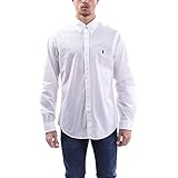 A multistep process that includes high-tension yarn-spinning gives this shirt's pure cotton poplin a dose of stretch for ease of movement.