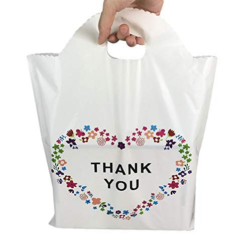 SES.CO, bolsa de compras de plástico con manija y leyenda "Thank you" y borde floral. Contiene advertencia de sofocación. Color blanco beige (100