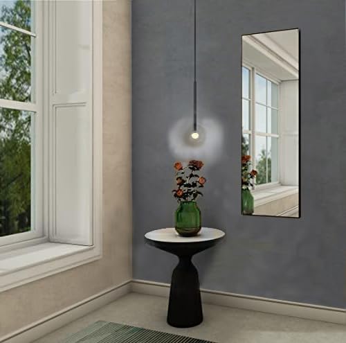 Miroir mural noir 120 x 40 cm pour agrandir un salon et voir sa tenue
