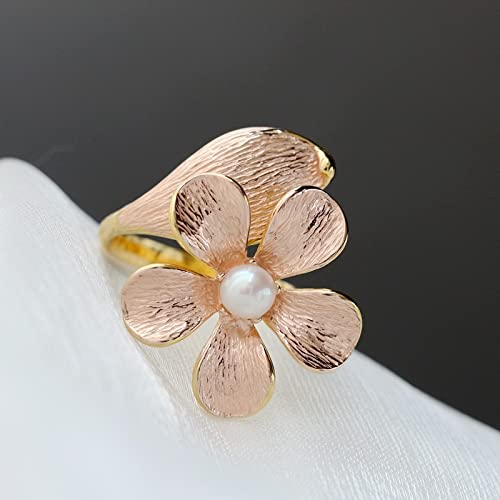 Bague ajustable en perle naturelle pour femme : l'élégance intemporelle d'un anneau ouvert