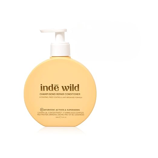 ind wild Champi Hair Conditioner For Bond Repair With 17 Amino Acid Complex Hydrating, Controls Frizz & Breakage Amla, Coconut Oil, Bhringraj & Biotin 300ml