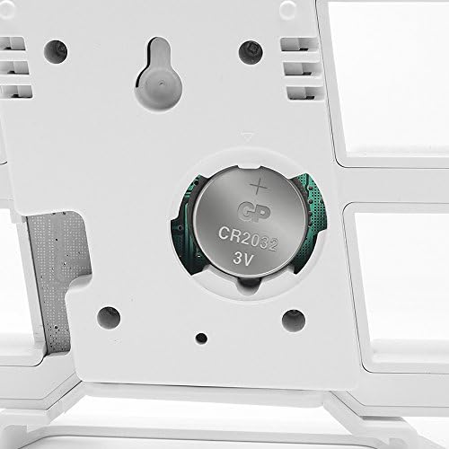 Close-up of the CR2032 battery compartment on the back of the Digoo DC-K4 clock