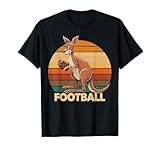 Questo design retrò a forma di canguro che gioca a calcio è perfetto per gli amanti dello sport vintage e gli atleti che apprezzano uno stile unico. Ideale per giornate di gioco o uscite informali, porta un tocco nostalgico al guardaroba di qualsiasi tifoso di football americano.