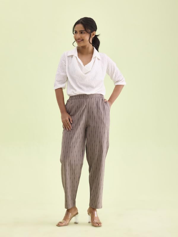 Image of GO COLORS Ikat Print Beige Printed Pencil Pant for Women | Breathable, Side Pocket