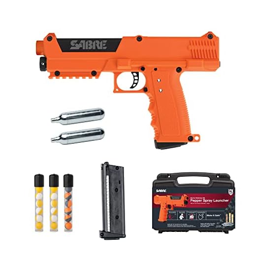 SABRE Pepper Spray Launcher — Pepper Spray Gun with 7 Red Pepper Projectiles, 14 Inert Practice Projectiles, 2 CO2 Cartridges and Storage Case — Home Security Defense Kit