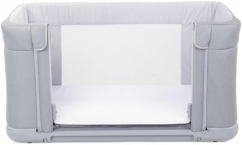 Chicco Next2Me Forever crib converted into a toddler bed with one side completely removed.