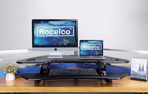 Rocelco 46" Height Adjustable Corner Standing Desk Converter with AC Outlet and USB Charger - Sit Stand Up Dual Monitor Tabletop Riser Workstation - Large Keyboard Tray - Black (R CADRB-46-ACUSB) by Rocelco - Used condition - Image 3