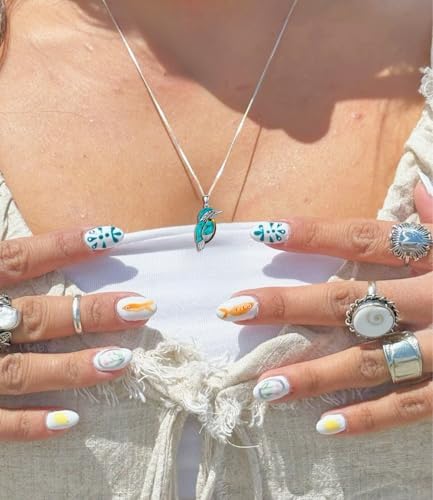 Unique birthday gift: handcrafted sterling silver pendant with vibrant turquoise and warm amber.