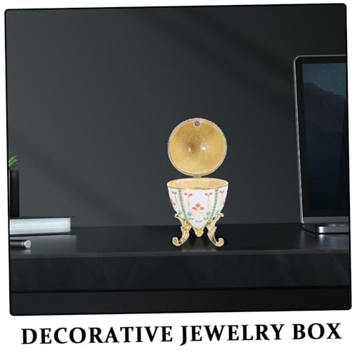 Boîte à bijoux œuf vintage en métal ciselé élégant