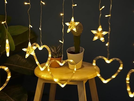 Image of V.E.S.P.A Christmas Lights - Featuring 6 Star and 6 Heart-Shaped Lights with Santa Claus Accents, Perfect for Diwali and Indoor Decor (Multi Color)