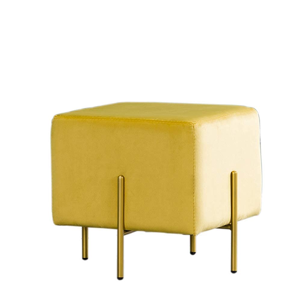 Repose-pieds en tissu jaune pour sublimer votre coin lecture ou votre salon moderne