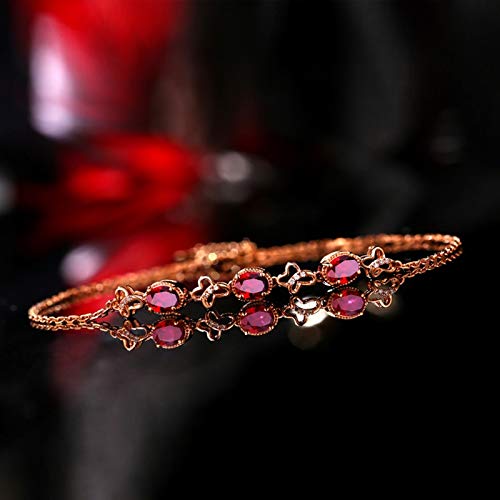 Bracelet papillon or rose 18k et rubis véritable de prestige
