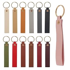 Products Contain: You will get 26pcs leather keychains, in 13 colors. Size: Leather keychain bulk are about 135mm/5.3in long, pendants: 112x30/4.41x1.18in, ring: 30x2mm/1.18x0.08in, inner diameter: 25mm/0.98in. Material: Leather keychains crafted wit...