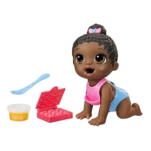 Baby Alive Lil Snacks Doll, Eats and Poops, Snack-Themed 8-Inch Baby Doll, Snack Box Mold, Toy for Kids Ages 3 and Up, Black Hair