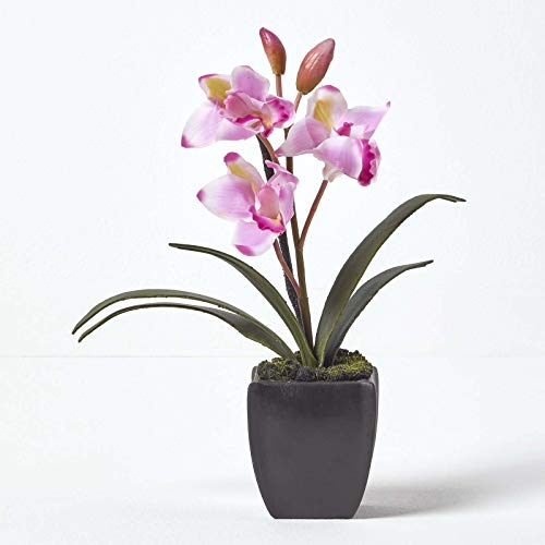 HOMESCAPES Small Light Pink Artificial Orchid With Lifelike Silk Flowers and Realistic Long Green Leaves Oriental Cymbidium Flower in Square Black Planter Pot 38cm tall for Indoor Decoration