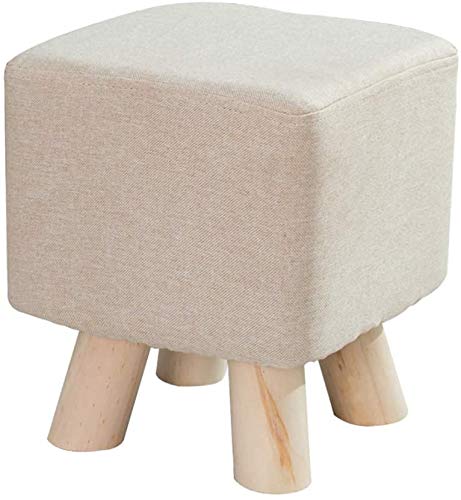 Tabouret en bois parfait pour créer un coin lecture cosy dans le salon