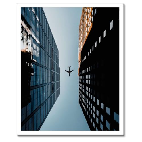 Poster avion entre bâtiments cadre noir 40x50 pour personnaliser un bureau