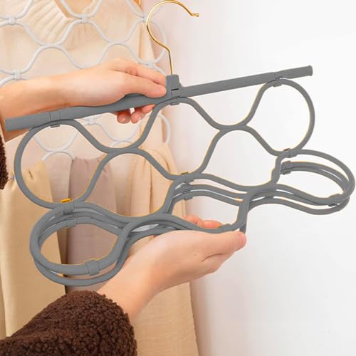 Cintres et porte-accessoires plastique gris au design épuré