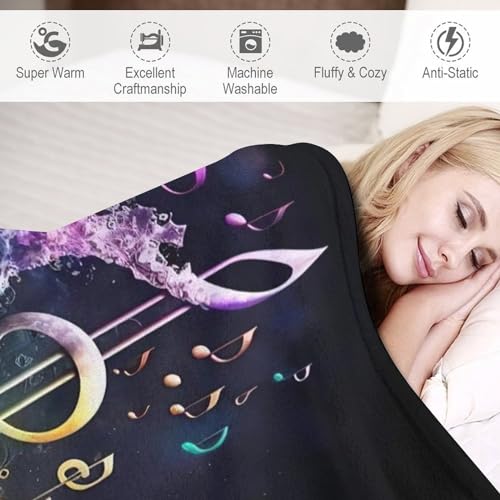 Couverture polaire note de musique pour cocooning sur le canapé