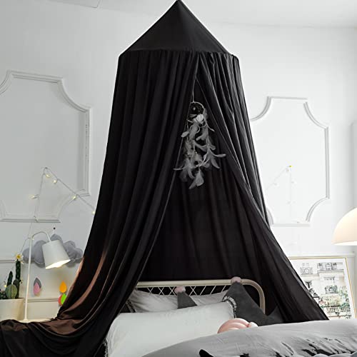 Create a Cozy Bedroom with a Black Canopy for Your Bed