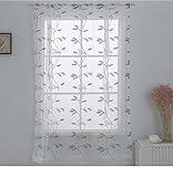 Composition : 100 % polyester - Couleur : blanc, bleu, vert - Finition : voile transparent avec motif brodé