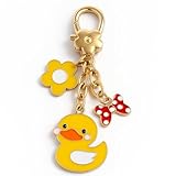 Fermoir fleur doré élégant et sécurisé : Conçu avec un beau fermoir en forme de fleur doré, ce porte-clés canard offre à la fois élégance et attache sécurisée. Accrochez-le facilement à vos clés, sac à main, sac à dos ou pochette, transformant n'importe quel objet en une pièce de déclaration ludique. Parfait comme charm de sac pour les femmes cherchant une touche unique.