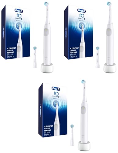 Image of Oral-B Rechargeable Electric Toothbrush, iO2 Starter Kit, 3 Cleaning Modes, Automatic Pressure Sensor to Protect Gums, 2 Brush Heads, Pure White (Pack of 3)