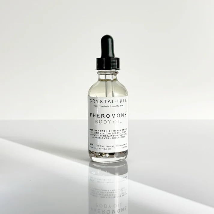 Crystal Irie Pheromone Body Oil Moisturizing Natural Body Oil, Herb & Crystal Infused Ritual Oil, Black Amber & Orchid Scent, Lightweight Hydrating Skin Oil with Vitamin E, 4 oz