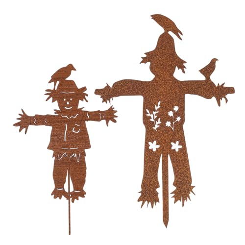 Two metal scarecrow garden stakes with rust finish
