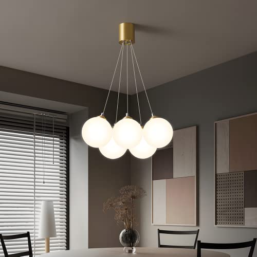 4 globe pendant lighting en laiton moderne pour sublimer la table