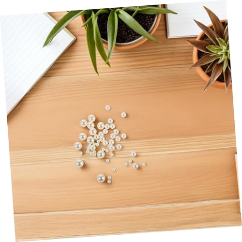 Perlas rellenas para decoración que solucionan jarrones vacíos en bodas 6