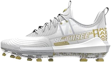 white and gold metal baseball cleats