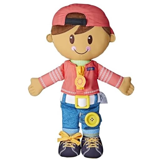Playskool Dressy Kids Doll with Brown Hair and Hat, Activity Plush Toy with Zipper, Shoelace, Button, for Ages 2 and Up (Amazon Exclusive)