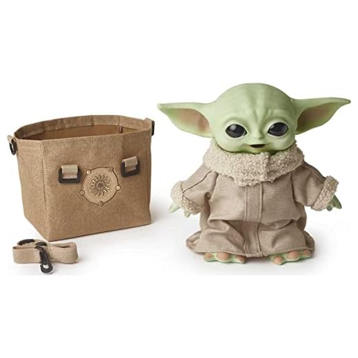 Star Wars The Mandalorian Peluche 28 cm Baby Yoda (El niño) con sonidos y bolsa de transporte, juguete para niños +3 años (Mattel HBX33)