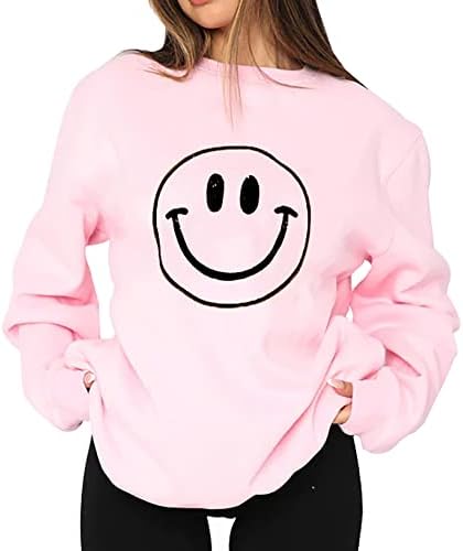 white hoodie with pink smiley face