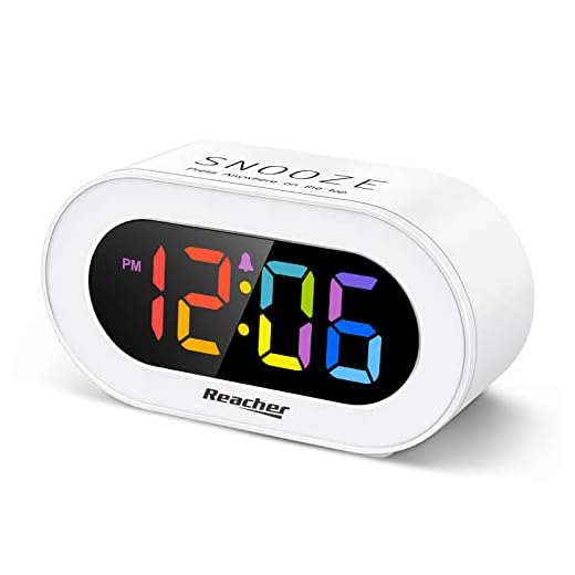 Reacher Small Colorful LED Digital Alarm Clock with Snooze, Simple to Operate, Full Range Brightness Dimmer, Adjustable Alarm Volume, Outlet Powered Compact Clock for Bedrooms, Bedside, Desk, Shelf