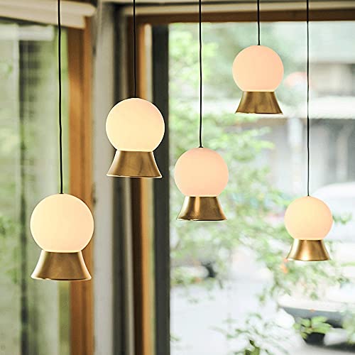 Lámpara colgante de globo para iluminar tu mesa de comedor con calidez 5