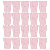 Markantes aussehen: die rosa-weiße farbgebung in kombination mit dem schleifendetail sorgt dafür, dass diese boxen sowohl funktional als auch optisch ansprechend sind