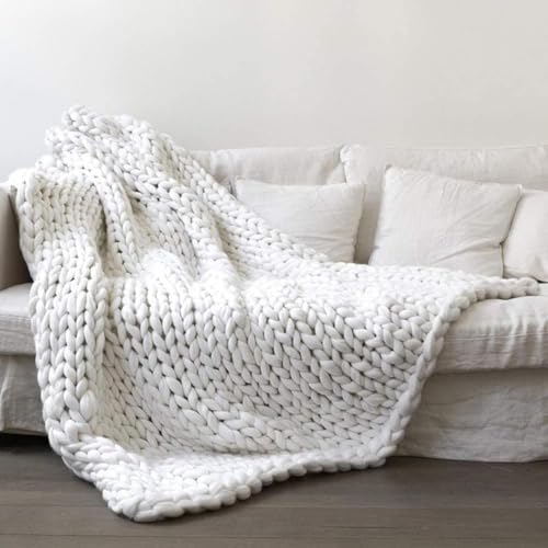 Couverture tricotée grosse maille rose pour cocooning sur canapé - 2