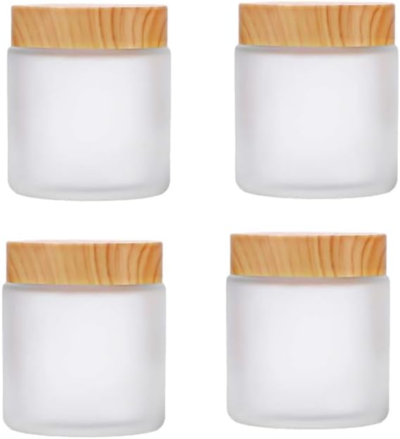 Paquete de 4 tarros de vidrio blanco esmerilado de 3.4 onzas de 3.4 onzas con tapas de grano de madera, tarros de cosméticos vacíos recargables para