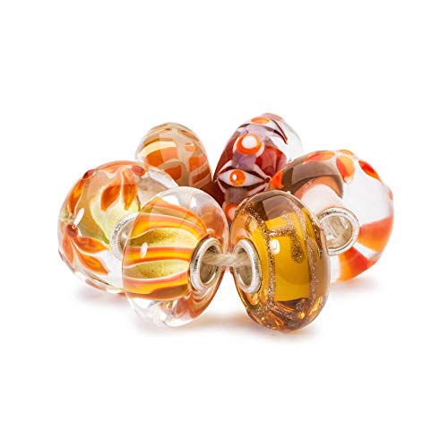 Le perle di vetro Trollbeads sono realizzate in vetro di Murano italiano. Sono fatti a mano individualmente sopra la fiamma aperta. Non due Trollbeads sono completamente simili.