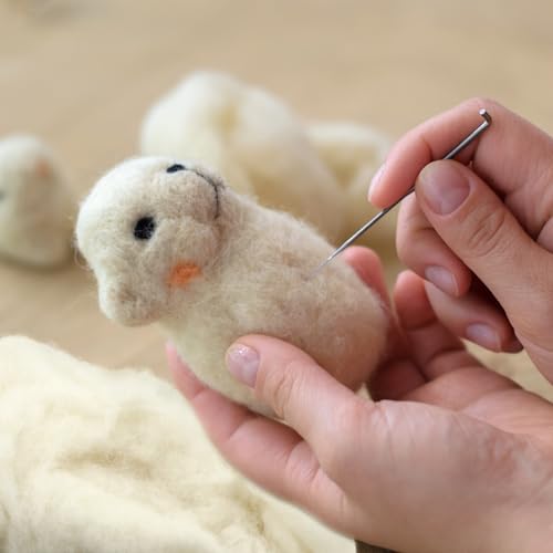 Image of Newwiee Clean Wool Batting Stuffing for Stuffed Animals Roving Wool Felting Filler for Crafts Needle Cushions Pillow Knitted Stuffed Toys Animals Blending and Dryer Balls, Natural White(1.1 lb) | Core Wool Roving for Needle Felting, Filler for Pillows Cushions Dryer Balls, Knitted Stuffed Toys Blending, Natural White
