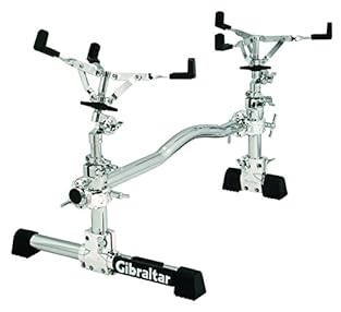 Utilizes two fine-gear adjust snare baskets mounted from the two vertical posts of the Stealth One basket cradles the mounted tom and the other basket is for the snare drum Rock solid foundation in a small footprint set-up