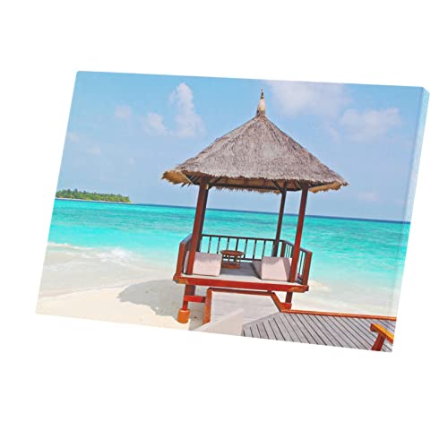 Tableau paillotte bord de lagon 60x40 : sublimez vos murs avec une toile déco vacances