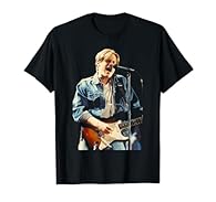 Relive some of the most visually striking moments of music, cinematic and sporting history with our range of Iconic Photo Moments clothing! All images are the copyright of and property of the Mirrorpix Photographic Library. Iconic Photo Moments merch...