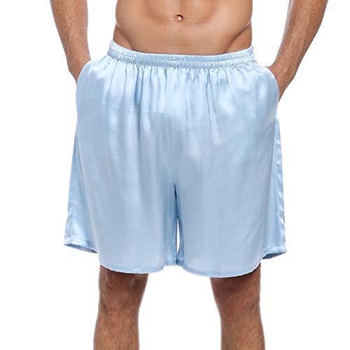 Pantalones cortos de deporte relajados de seda pura con bolsillos frontales