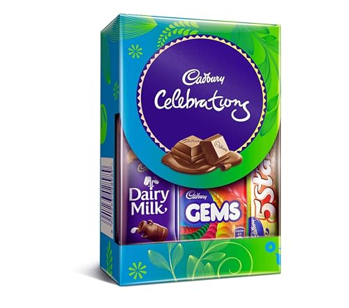 Image of Rakhi gift for girls /rakhi gift hamper for sister-Decorated tray+Box of Cadbury Celebrations chocolate+water bottle+set of pins+pair of jhumki+Heart shaped candle+ring with box+Card